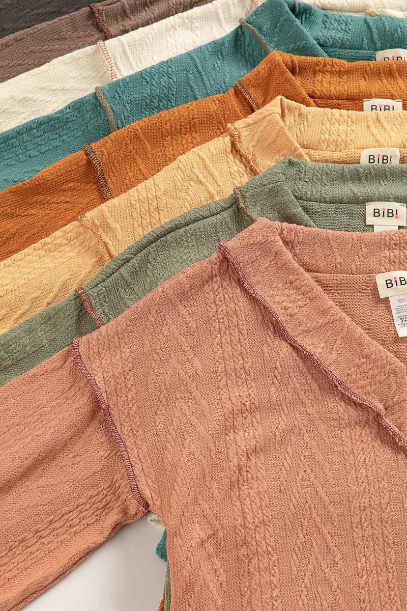 BiBi Textured Exposed Seam Drop Shoulder V-Neck Knit Pullover Sweater | Rust