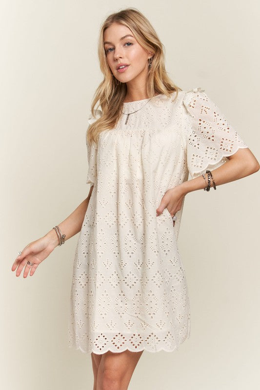 ADORA Ruffle Shoulder Eyelet Round Neck Scallop Edge Detail Mini Dress | Natural