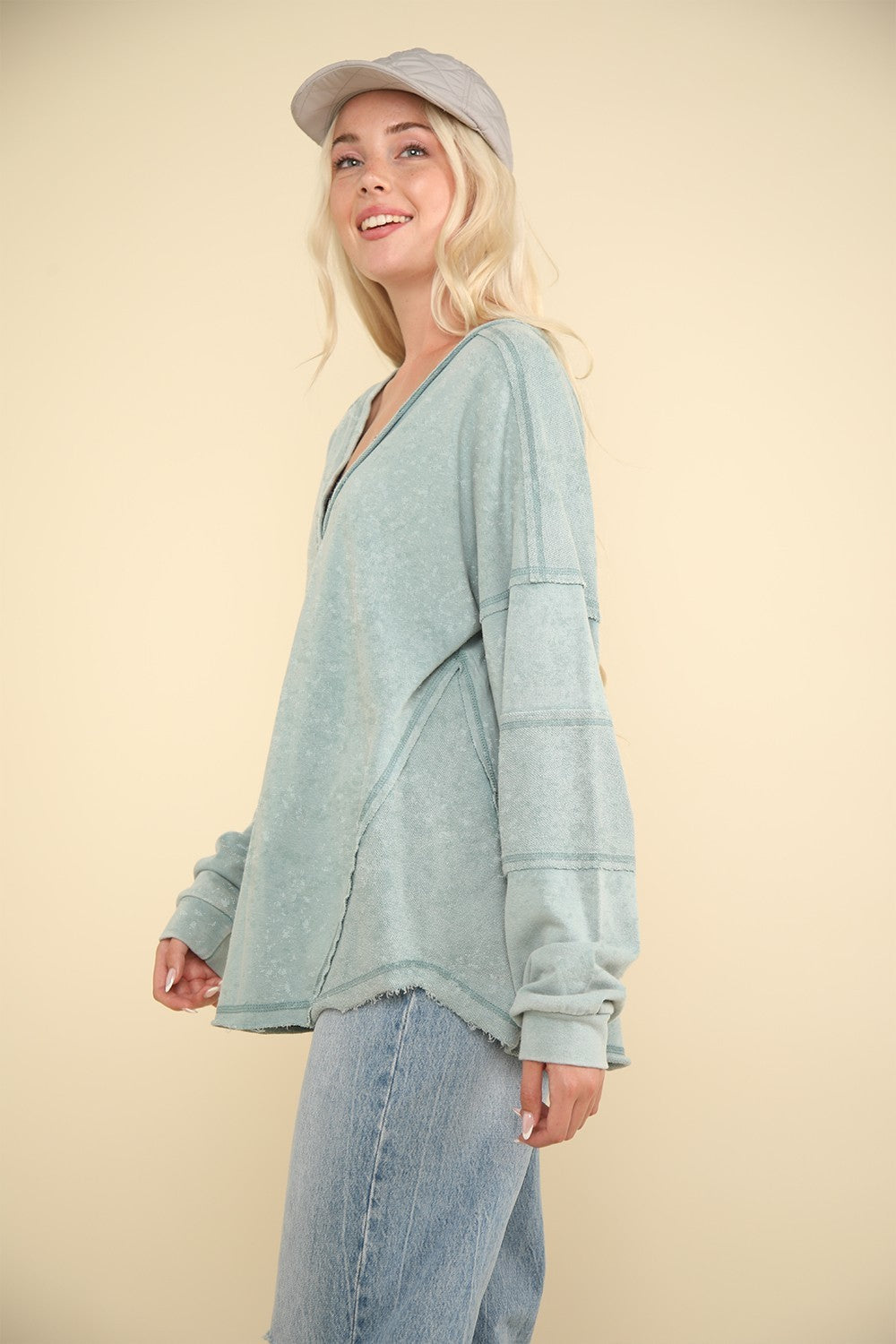 VERY J Washed V-Neck Raw Edge Button Trim Curve Hem Oversized Knit Top | Sage