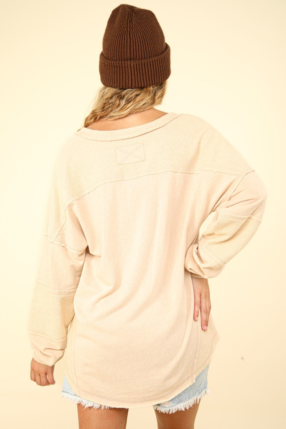 VERY J Washed V-Neck Raw Edge Button Trim Curve Hem Oversized Knit Top | Beige